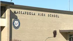 Lawsuit: Massapequa student claims he was locked in bathroom, groped by janitor