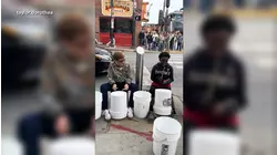 The godmother of drumming jamming out with a street performer