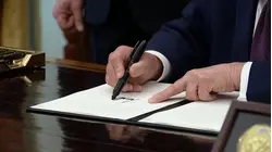 Trump signs executive order to crack down on mail-in voting