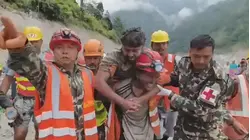 2 men found alive after being trapped for over a week by Nepal floods