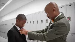 Students suit up to become 'Distinguished Young Gentlemen' in after-school club