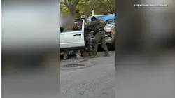 Federal agents break car window, detain man in West Town: VIDEO