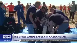 A US-Russian space crew lands safely in Kazakhstan after an 8-month stint on ISS