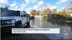 Residents in The Hole clean up flood aftermath
