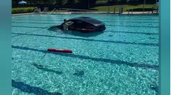 Car drives into Waveny Park swimming pool
