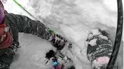 Watch: Skier Buried in Several Feet of Snow Rescued