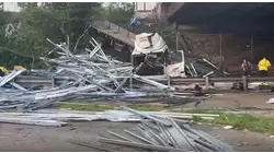 Metal debris from truck crash closes 2 northbound lanes of Route 1&9 Truck in Newark