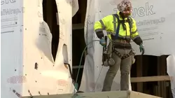 Workers battle the dangerously cold temperatures