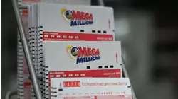 Mega Millions Jackpot Rises to About $900M Ahead of Drawing