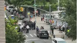 Officers in tactical gear surround apartment building in Bushwick