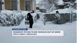 Helping hands clear the streets of Perth Amboy following Sunday night Blizzard