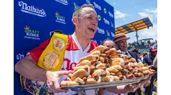 Joey Chestnut to defend hot dog eating title while on probation after pleading guilty to battery