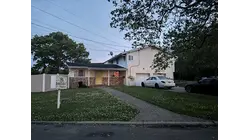 Two women charged after police uncover alleged brothel in Dix Hills home