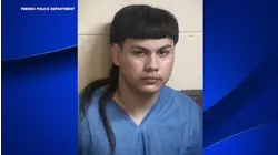 Fresno police release video of officer striking armed suspect with patrol car