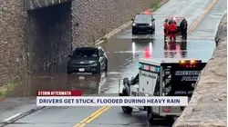 Flooding snarls traffic, strands drivers and renews drainage concerns