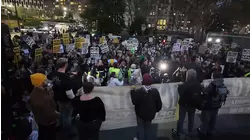 Protesters march in Lower Manhattan in response to ICE raids in NYC