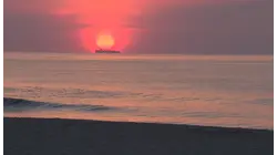 Beach towns brace for big crowds as heat wave and holiday weekend collide