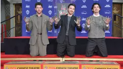 Jonas Brothers cement handprints at TCL Theatre
