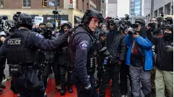 Tensions Rise in Protests over Minnesota ICE Shooting