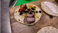 The BBQ King creates sizzling fajitas from flank steak