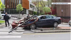 Car crashes into sculpture and street light at Ossining intersection