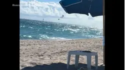Video shows paraglider's terrifying plunge off Florida coast