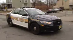 Police officer hit by vehicle during Dominican parade in Paterson, driver arrested