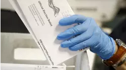 Trump says he will lead the charge on ending mail-in ballots