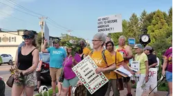 Port Washington community members call for an end of ICE violence with march, vigil