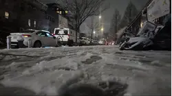 Code Blue, flight delays and icy conditions amid snowy night in Brooklyn